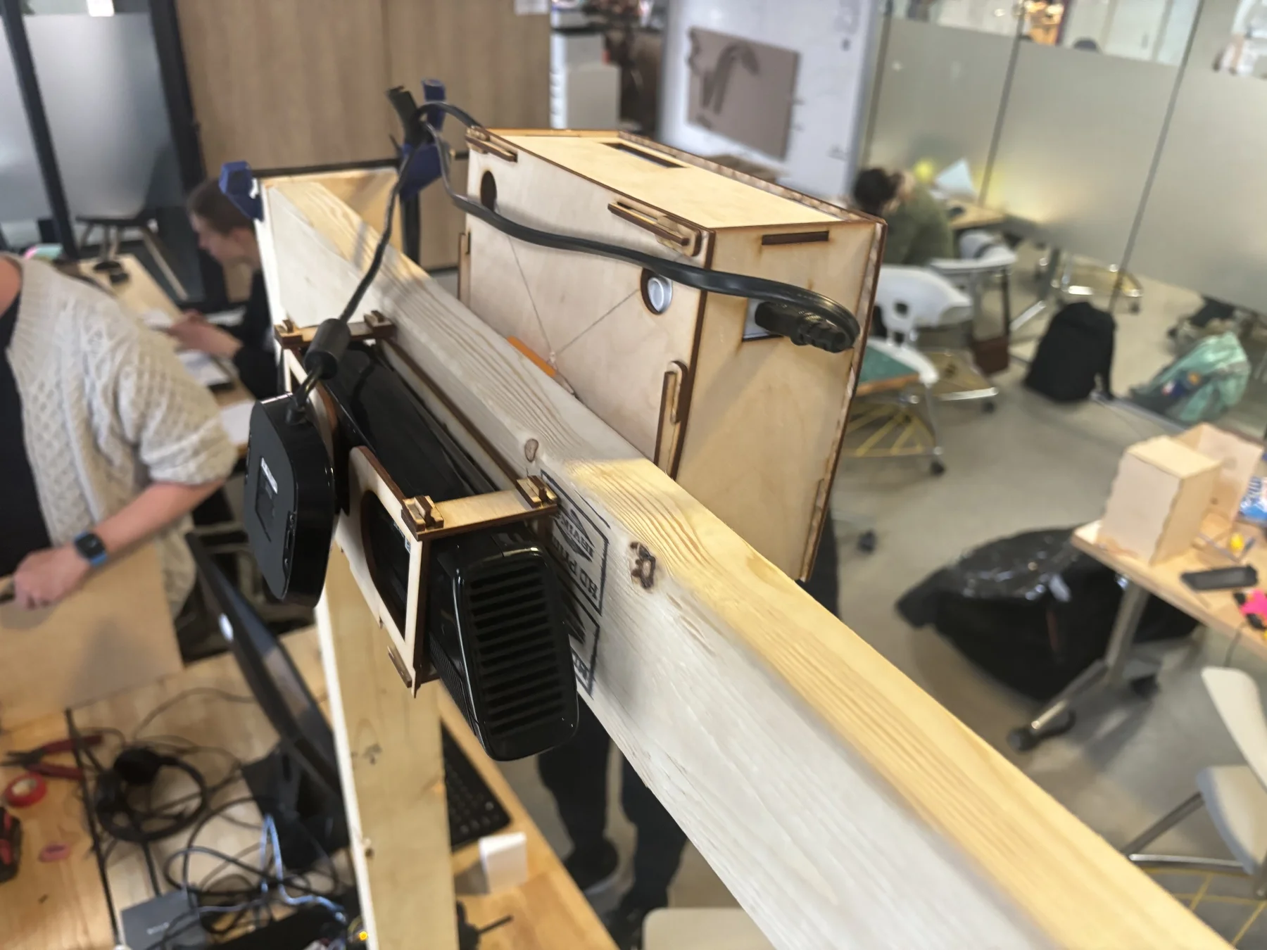 Complete wooden frame system showing projector and sensor mounting
