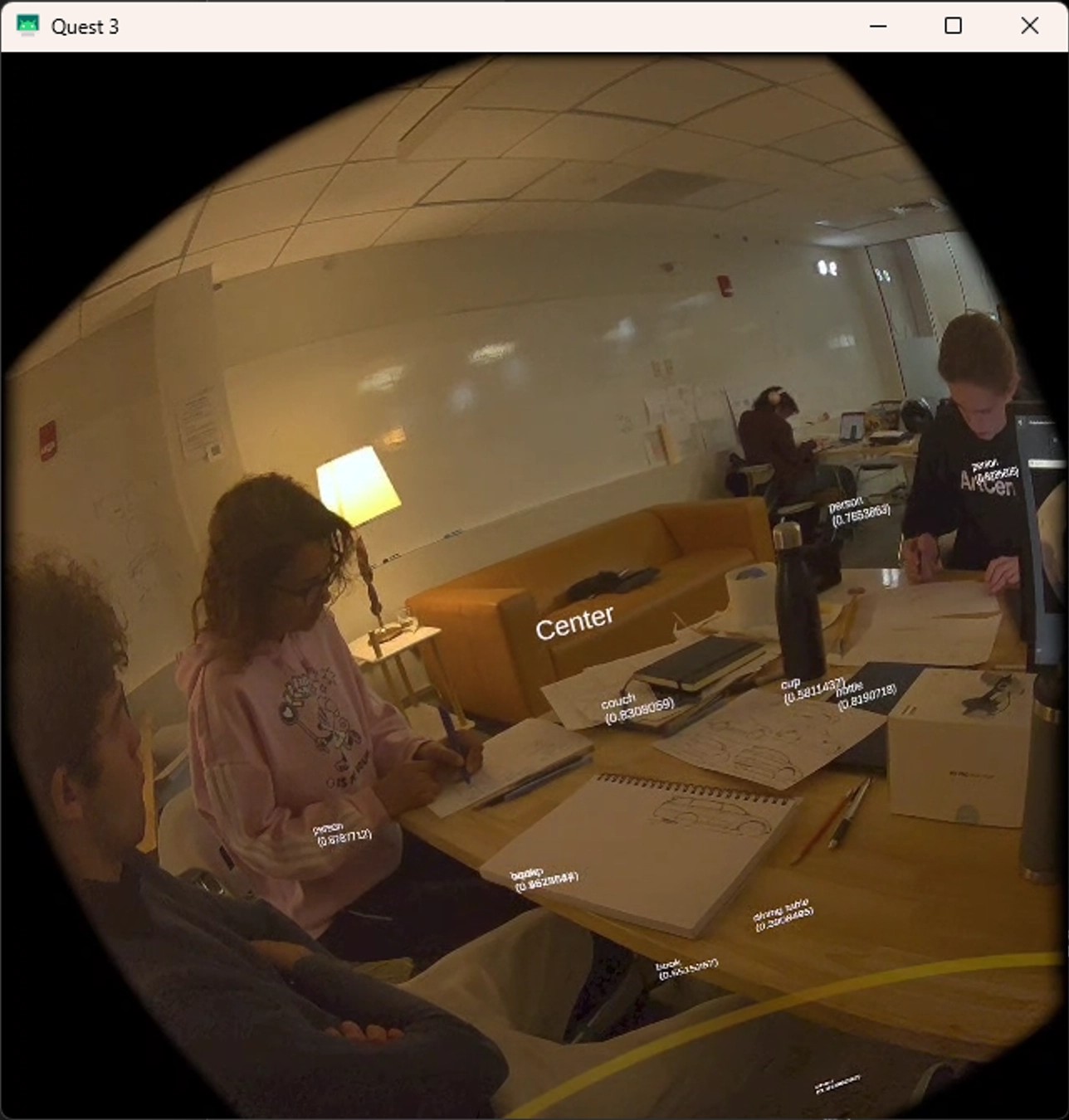 Quest 3 fisheye view showing office environment with Spanish vocabulary overlays