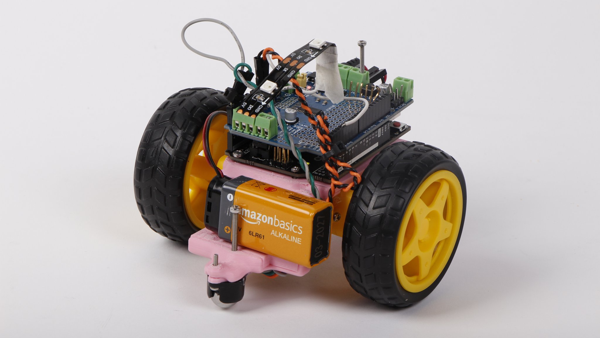 Mid-stage prototype showing evolution from cardboard to wooden components